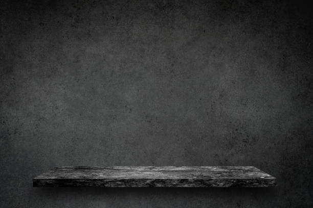 istock Empty top of black marble stone table on concrete wall background texture grunge and grey surface with space or display for add text or image and product. Loft style. 920743998