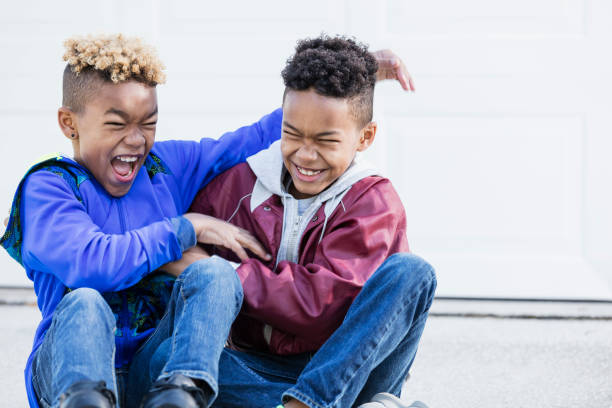 istock Little boys, brothers and best friends, laughing 920744122