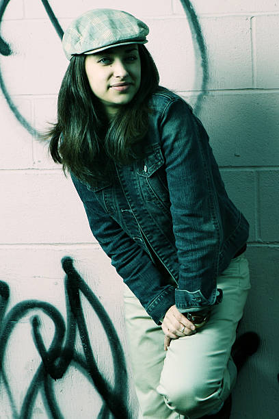 istock Young Woman against a Graffiti Wall 92074472