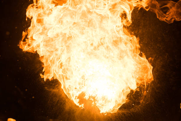 istock Bright flash of fire, against the black sky 920746330
