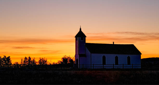 istock An old country church at sunrise 920752300
