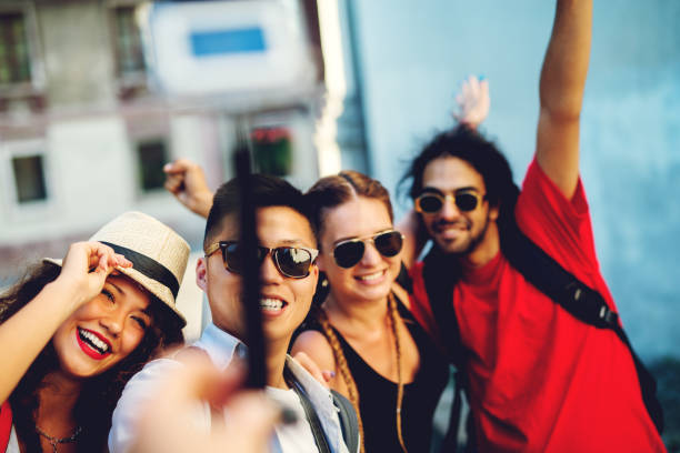 istock Multiracial friends taking selfie. Having a nice day, enjoying exploring smiling. 920755056