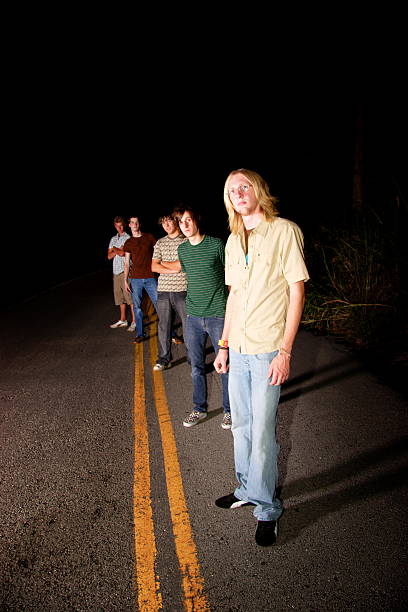 istock teen rock band on road 92075676