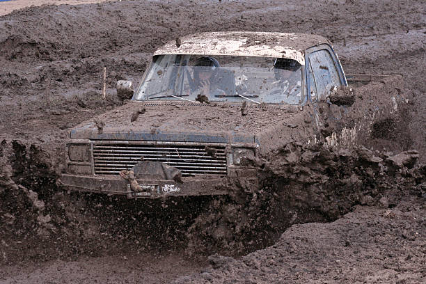 Splashing Through Mud stock photo