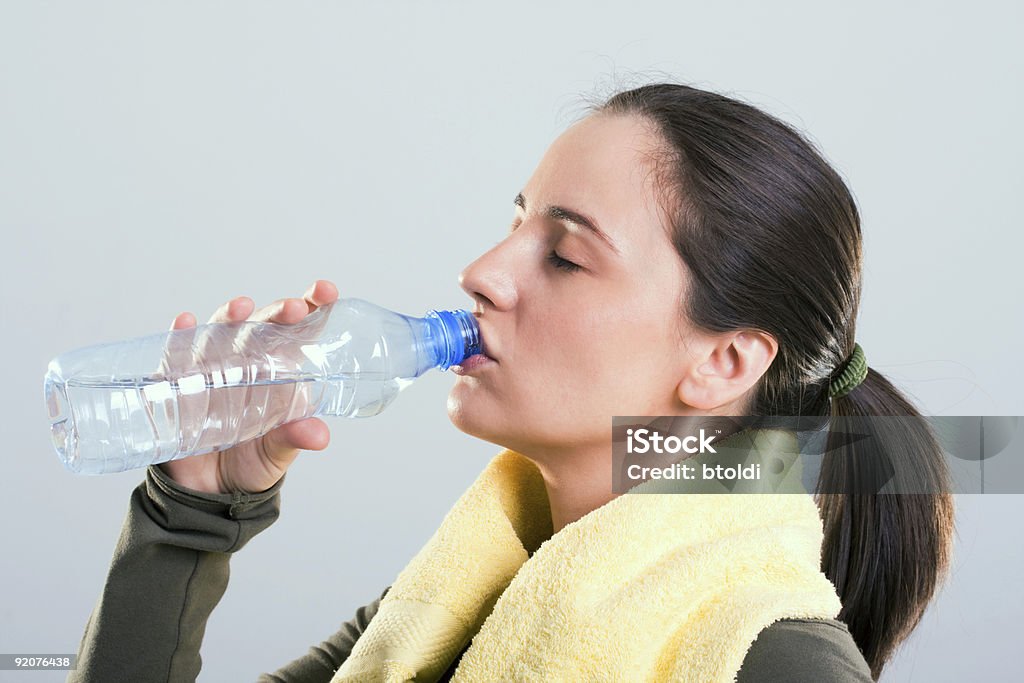 Girl drinking water  Adult Stock Photo
