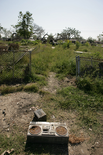 In the Ninth Ward of New Orleans a boom box lays in front of a property cleared by the flood waters after Katrina.