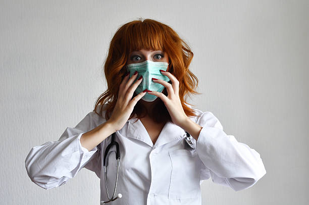 istock Female doctor seizes her mask 92077195