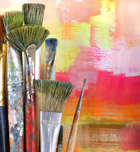 istock Used paintbrushes against art background 92077282