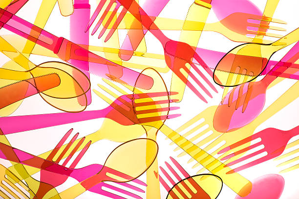 istock Set of colored plastic forks and spoons 92077531