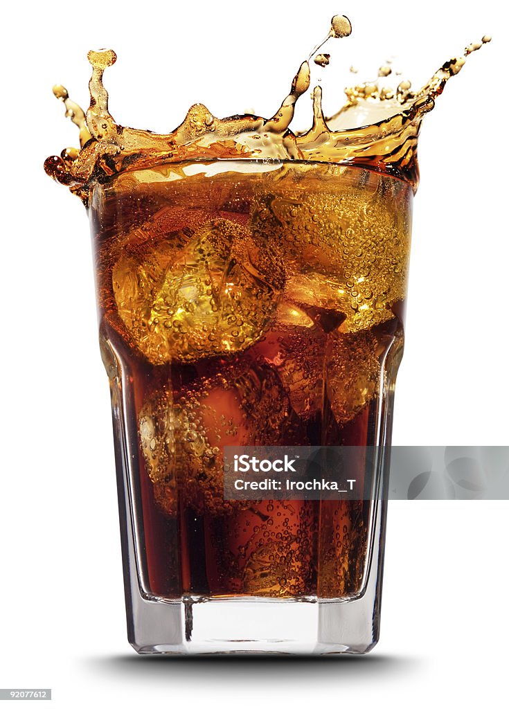 Close-up of splashing cola after adding ice cubes http://i136.photobucket.com/albums/q193/Irochka_T/Baner_Paint.jpg Cola Stock Photo