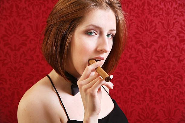 istock Woman on Red with Cigar 92078471