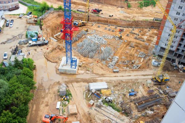 istock Blurred crane and building construction site as background 920787276