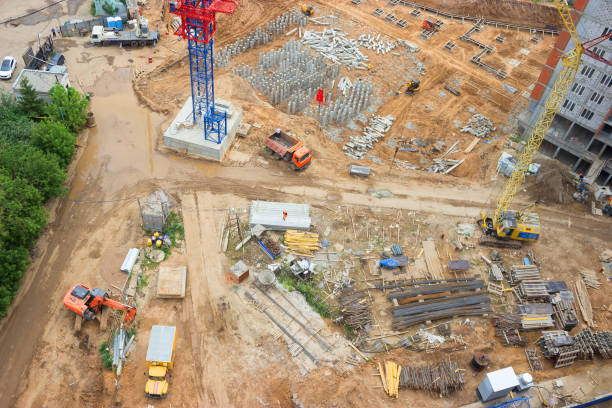 istock Blurred crane and building construction site as background 920787284