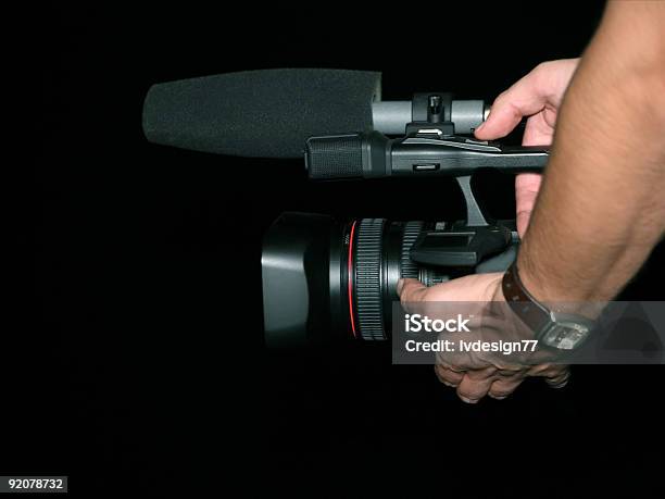 Filming Stock Photo - Download Image Now - Black Background, Black Color, Camera Operator