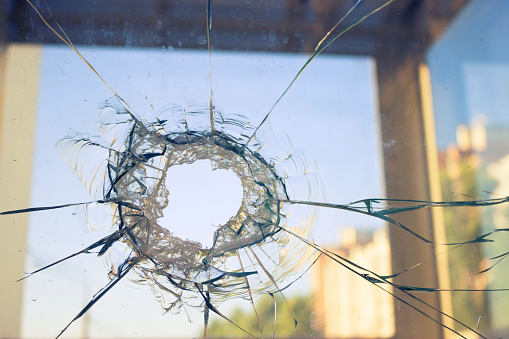 A broken window in a shop