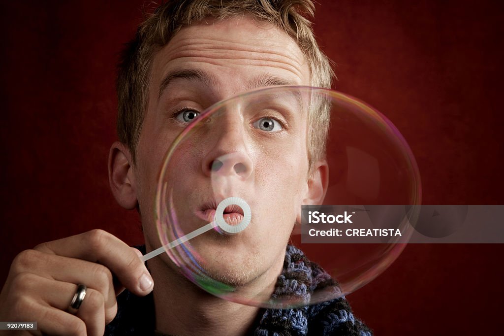 Jeune homme souffler de pensée - Photo de Horizontal libre de droits