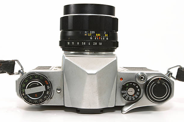 Rangefinder film camera on concrete surface in a sunny day