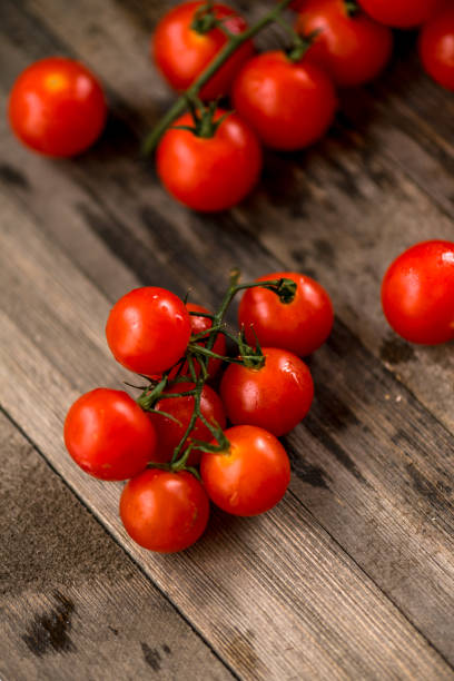 istock Ripe cherry tomatoes on the vine 920804682