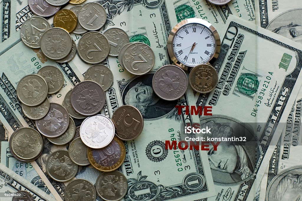 Time is money- clock, dollars and coin  Above Stock Photo