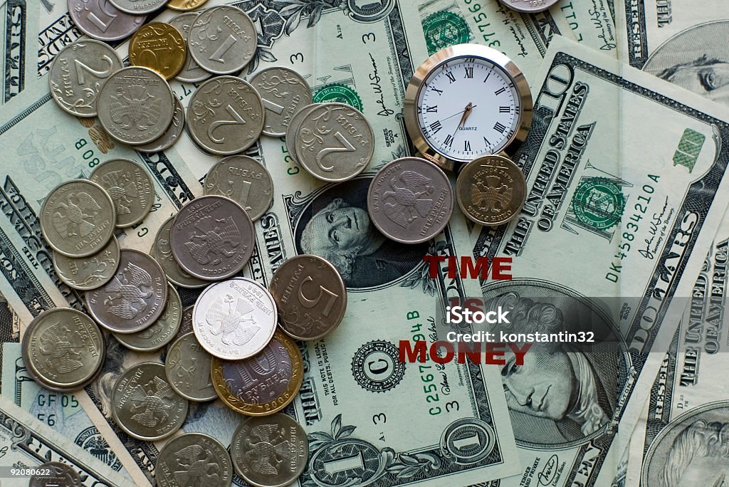 Czas jest money- Zegar, dolarów i moneta - Zbiór zdjęć royalty-free (Banknot)
