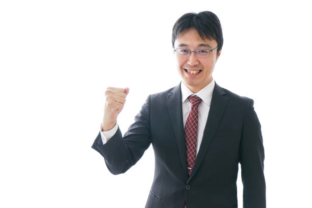 istock Businessman holding up fists 920809200