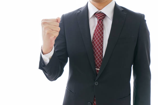istock Businessman holding up fists 920809214
