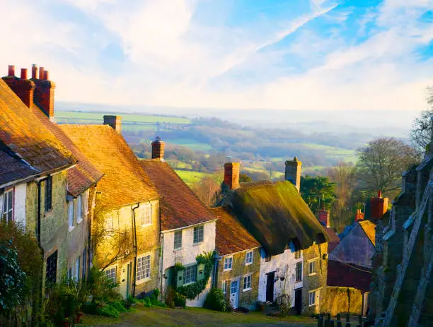 Old cobblestone houses in Gold Hill, Shaftesbury Dorset  at sunset