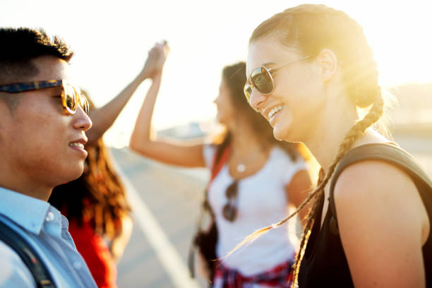 istock Close up of joyful woman laughing while looking at smiling man. 920820916