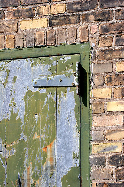 istock Brewery door latch on door with chipped paint 92084351