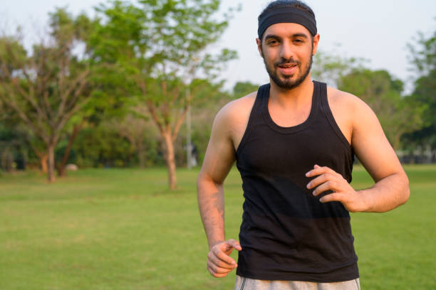 istock Indian Man Running In Park 920852622