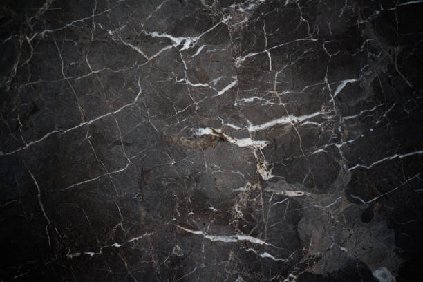 istock black stone marble background and texture with dark vignette 920862824