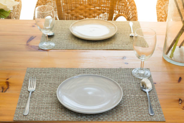 istock Casual table setting on wonden table near the beach, Dining table layout 920862848