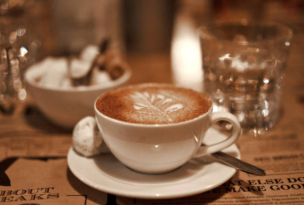 Cup of coffee on the table in the restaurant
