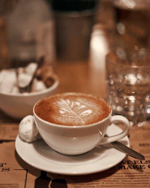 Cup of coffee on the table in the restaurant