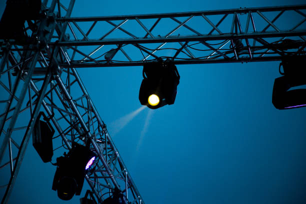 istock Color searchlight at a concert at night 920889500