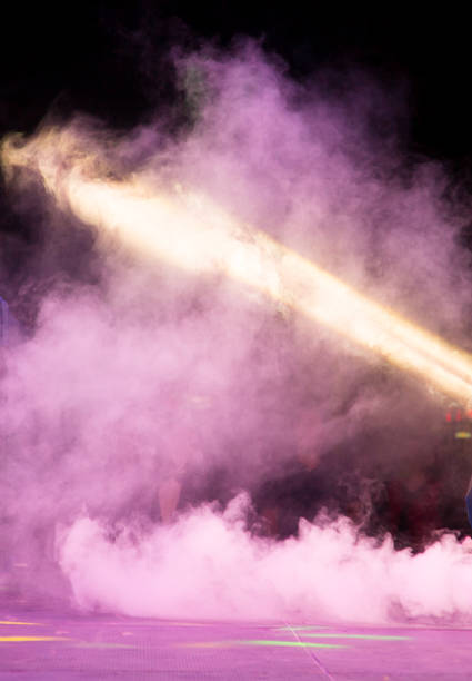 istock Multi-colored smoke at the concert at night 920891620