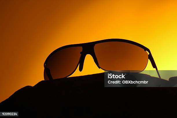 Gafas De Sol Foto de stock y más banco de imágenes de A la moda - A la moda, Alto - Descripción física, Amarillo - Color