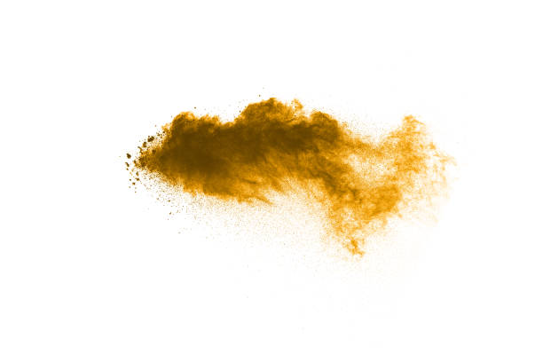 istock coco color particles splatter on white background. Deep brown dust splash on white background. 920902468