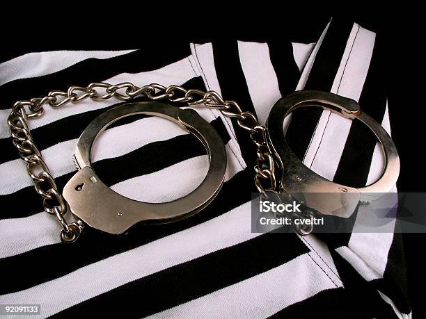 Prison Break Stock Photo - Download Image Now - Prison, Shirt, Black And White