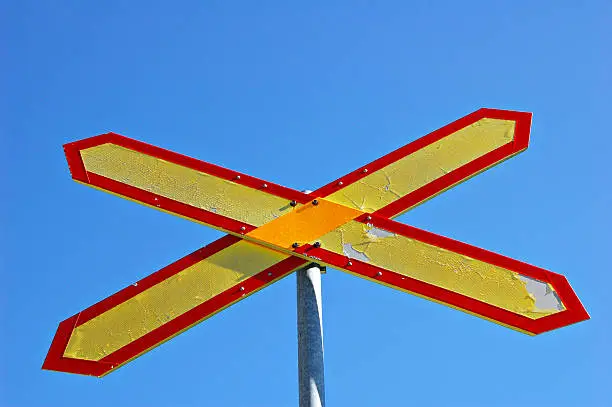 Level crossing sign in Finland