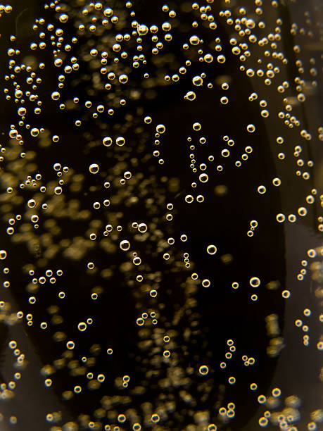 Macro of sparkling champagne  champagne bubbles stock pictures, royalty-free photos & images