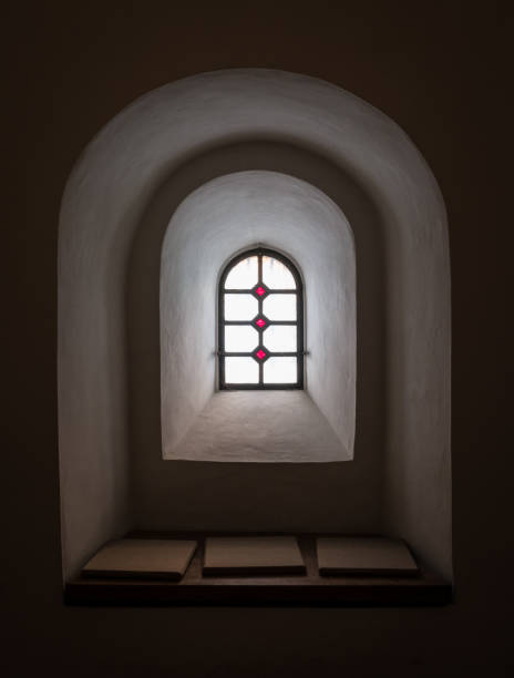 istock The old and ancient window in dark room 920932112
