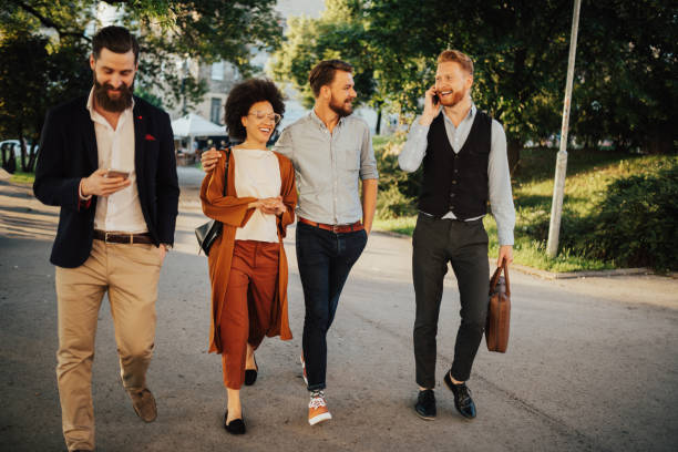 istock Happy coworkers walking to their office 920935672