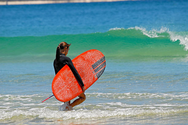 istock Girl going for a surf in Noosa 92093756