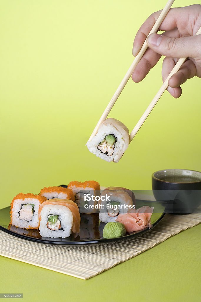 All sorts sushi on green  Cut Out Stock Photo
