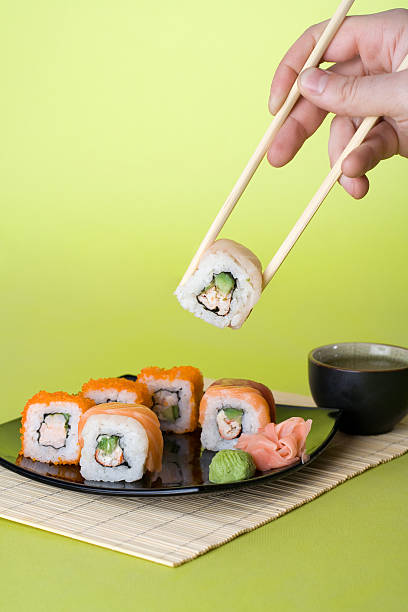 All sorts sushi on green stock photo