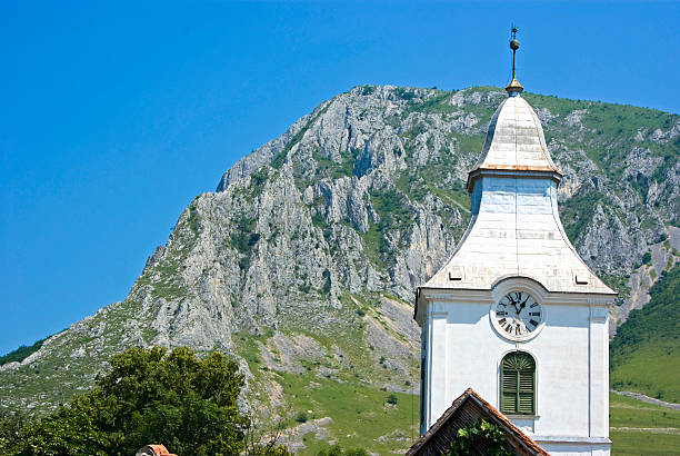 White church with mountain stock photo