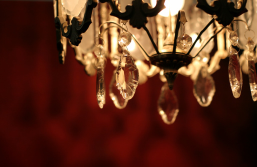 photo of elegant chandelier in a luxury interior, close up