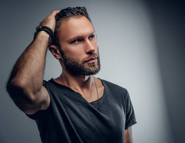 istock beard male in grey t shirt. 920954308