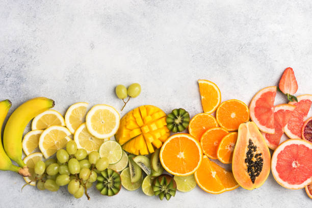 istock Top view of rainbow fruits and berries 920956690